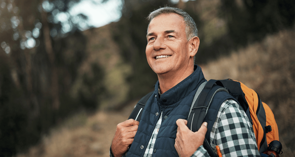 mature man smiling outdoors